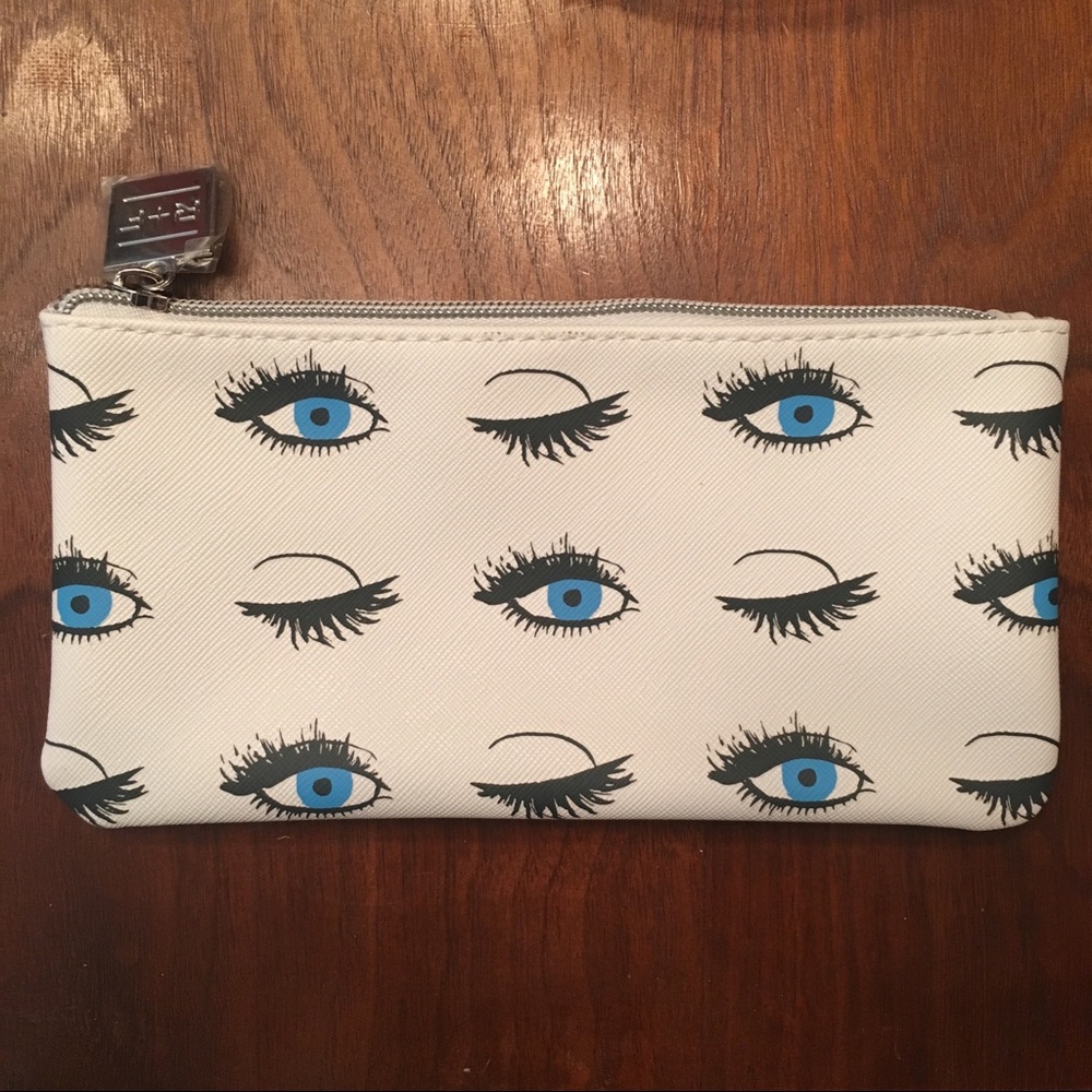 Rodan & Fields lash boost cosmetic bag